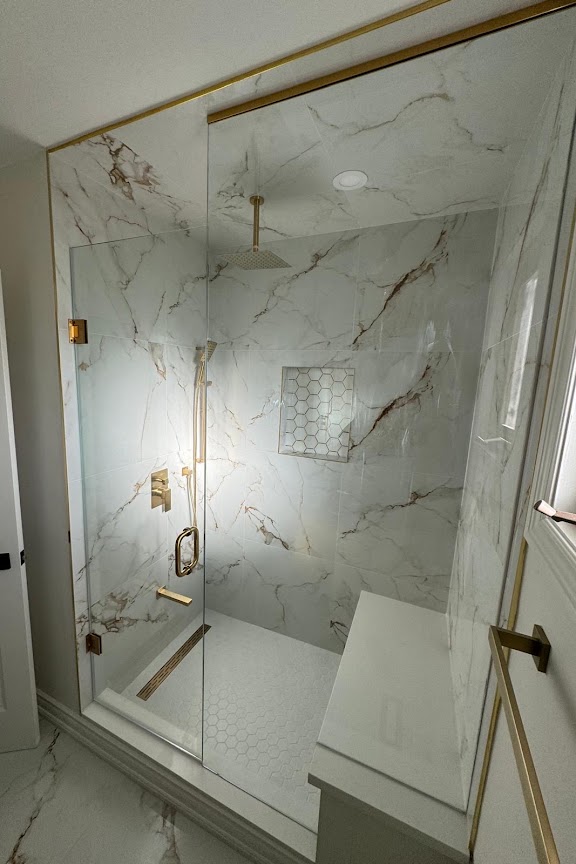 Luxury marble-tiled walk-in shower renovation, Scarborough