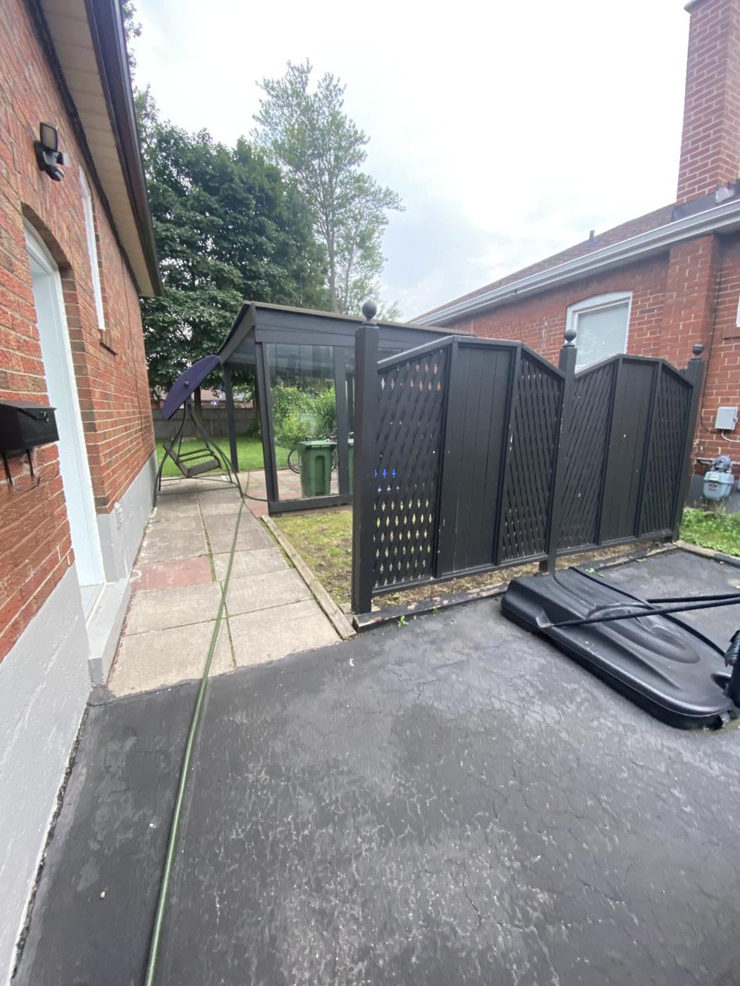 Side yard and driveway of the Bendale bungalow before the detached garage was built