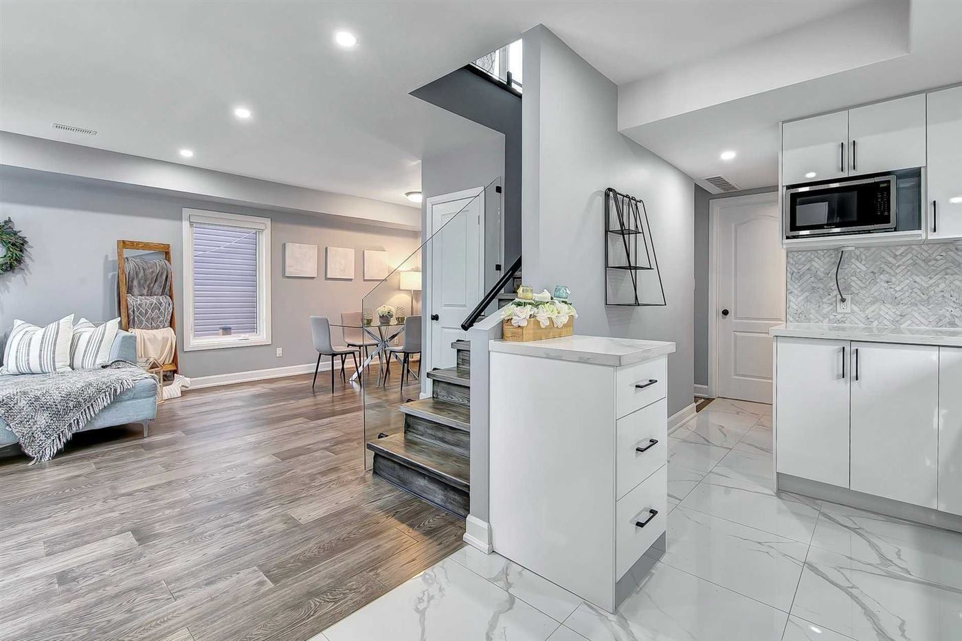 Open-concept main floor with new finishes, East Street project